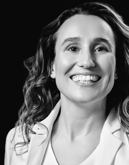 Foto van Sandra die aan het glimlachen is